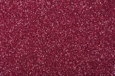 Pırıl pırıl bir arka plan, parlak mor tonda parlak bir yüzey, yeni bir Noel dokusu. Yüksek çözünürlüklü fotoğraf.