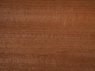 Bu resim, yüksek kalite ahşap işçiliği için sıcak ve ince estetik bir ideal yayan Makore kaplamasının düzgün dokusunu ve tutarlı tarçın-kahverengi rengini vurgular.