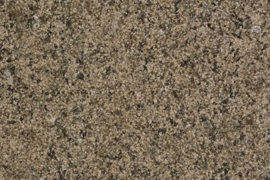 Koyu bej renkte doğal granit doku. Yüksek çözünürlüklü fotoğraf.