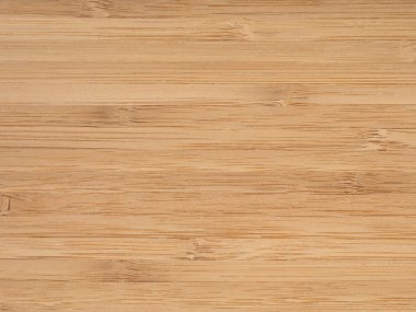 Bu resim bambuların doğal çekiciliğini gösteren eşsiz çizgileri ve sıcak renk paletini vurgulayan koyu bir bambu daracık tahta kaplamayı sergiliyor.