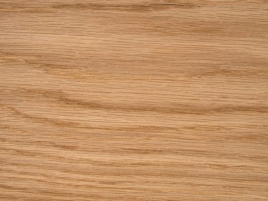 Bu resim, Avrupa meşe kaplamasının kendine özgü zarafetini sergiliyor, altın renkli ahşap yüzey boyunca doğal çizgiler barındırıyor, sıcak ve sofistike bir ortam yaratmak için ideal.