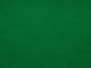 Bu görüntü orman yeşili keçenin davetkar dokusunu yakalar, hayal gücünü harekete geçiren ve ruhu rahatlatan derinlik ve dinginliğin görsel bir senfonisini sunar.