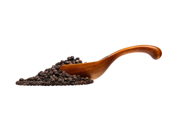 Black pepper in the wooden spoon, isolated on white background.