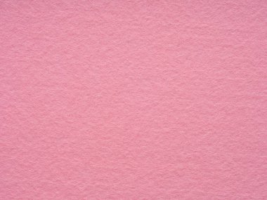Texture of soft pink felt material close-up. Handicraft concept, crafts, DIY, do it yourself. Top view, flat lay, layout, place for text. For shops with goods for creativity patchwork or art work