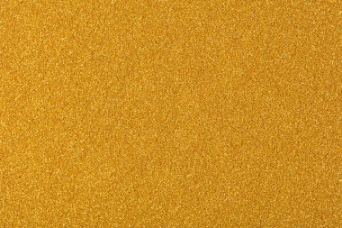 Parlak parlak doku, mükemmel altın tonda Noel duvar kâğıdı. Yüksek çözünürlüklü fotoğraf.