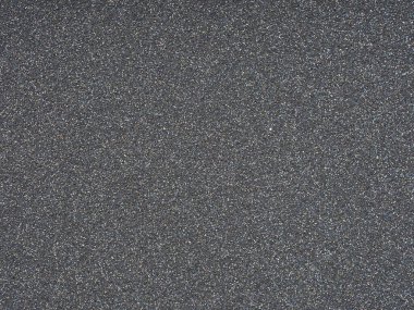 Koyu gri parıltılı doku. Alışılmadık, abartılı Noel, Yeni Yıl, Noel hediyesi kartı ya da diğer tatil resimlerinin dekorasyonu ve tasarımı için holografik ışıltılı parıltılı bir desen..