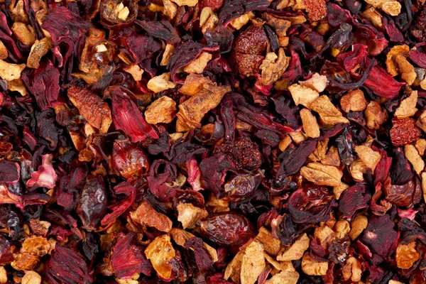 Fruit tea,Ingredients: Apple pieces, hibiscus, rose hips, elderberry, passion fruit, strawberry, kiwi, freeze dried raspberry, rose petals, aroma. — Stock Photo, Image