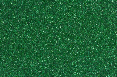 Zümrüt yeşil parıltı doku veya arka plan.