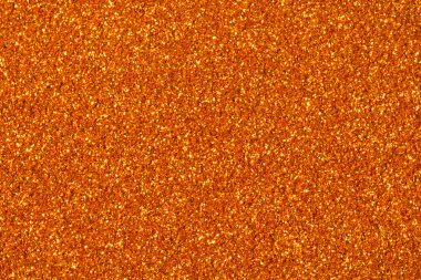 Turuncu glitter pırıltı. Tasarımınız için arka plan.