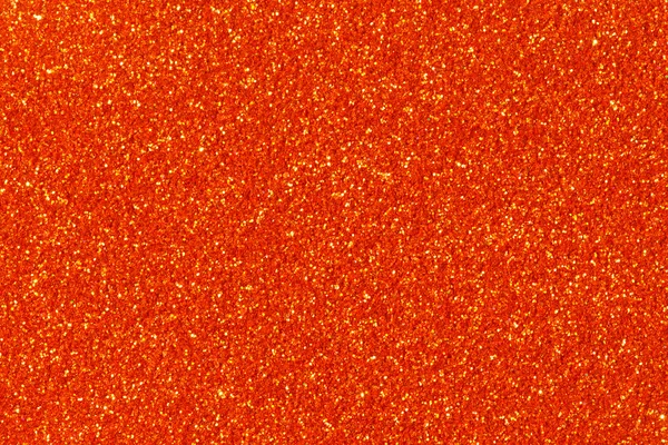 Orange glitter texture (background).
