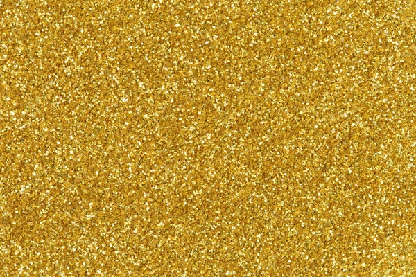 Guld glitter textur jul bakgrund. — Stockfoto