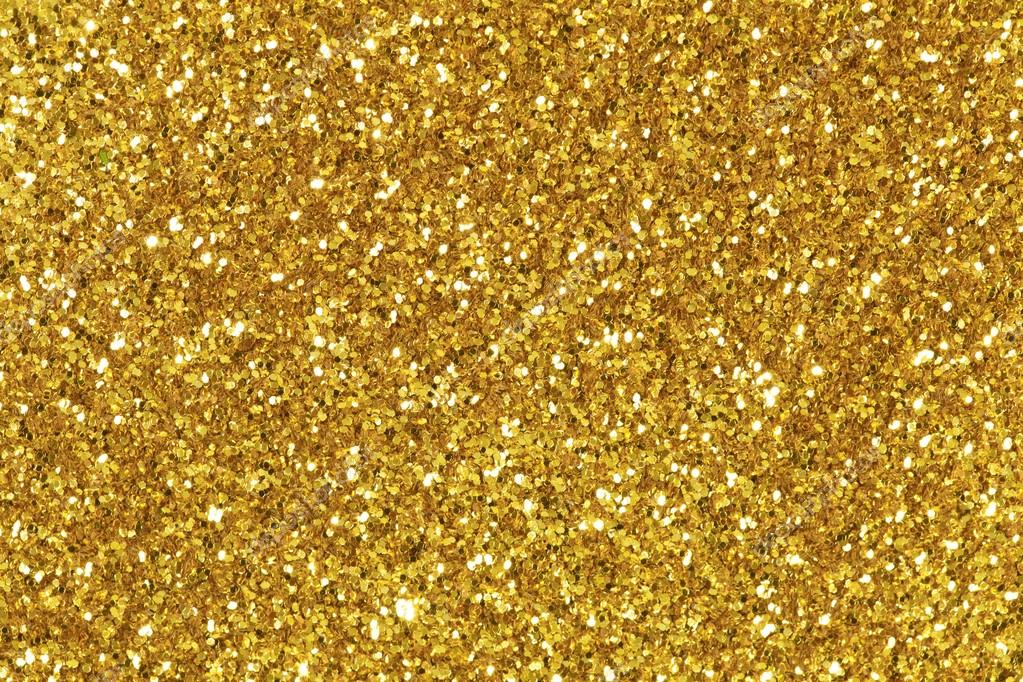 Background filled with shiny gold glitter. Stock Photo by ©yamabikay