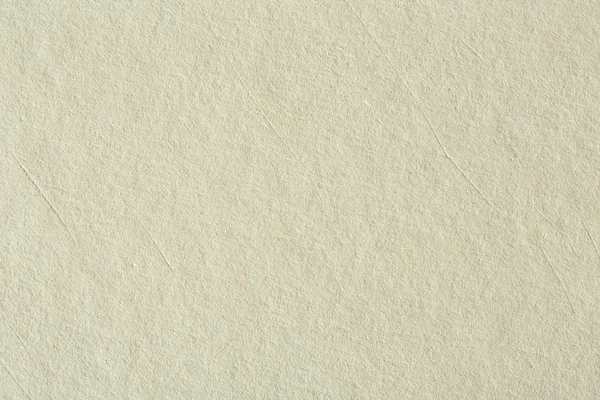 Gerecycleerd papier textuur achtergrond in licht crème sepia kleur ton — Stockfoto