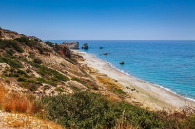 Petra tou Romiou'nun panoramik gün batımı manzarası (Kaya 