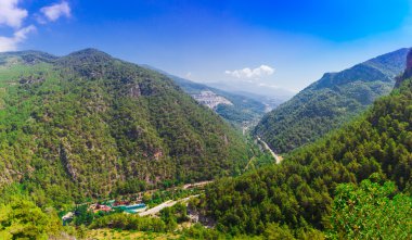 Mountain panoramic landscape of valley Dimcay, near of Alanya, Antalya district, Turkey, Asia. View near famous cave Dim Magarasi Summer bright day clipart