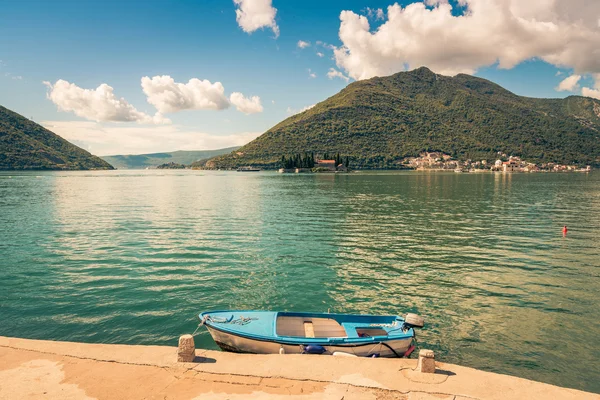 Harbour and boat at Boka Kotor bay (Boka Kotorska), Montenegro, Europe. Toning image. — Stock Photo, Image