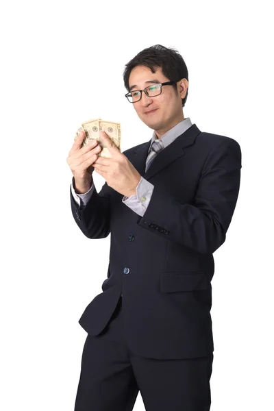 Sucesso Asiático empresário segurando dinheiro dólar, isolado — Fotografia de Stock