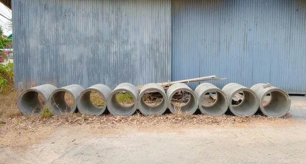 Concrete drainage pipes stacked for construction Royalty Free Stock Images