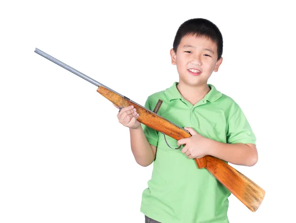 Menino e brinquedo arma rifle isolado no fundo branco — Fotografia de Stock