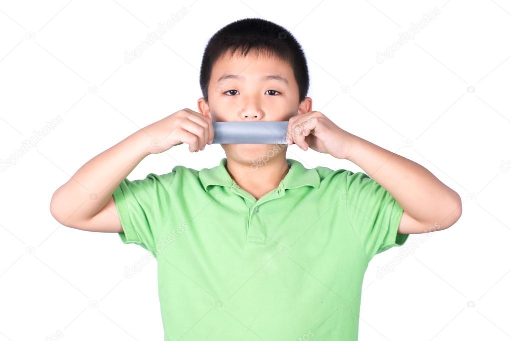 Little boy with wrapping adhesive tape around mouth, rights of a child, isolated on white background