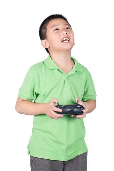 Niño pequeño sosteniendo un control remoto de radio (auricular de control) para helicóptero, avión no tripulado o avión Aislado sobre fondo blanco —  Fotos de Stock