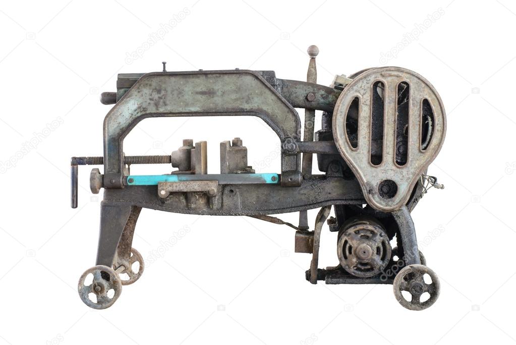 old dirty hacksaw machine industry tool. Isolated.