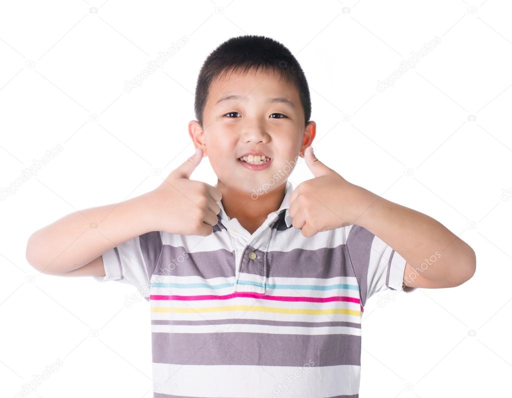 Asian boy giving you thumbs up over white background, isolated