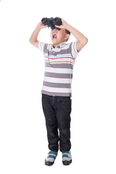 Asian boy holding binoculars, isolated on a white background — Stock Photo, Image