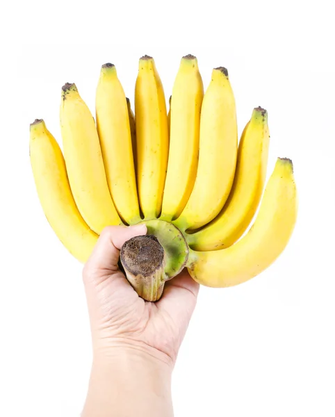 Чоловік тримає купу бананів, ізольовані на білому тлі — стокове фото