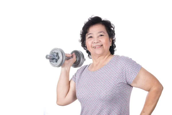 Asian strong senior woman lifting weights, isolated on white bac — Stock Photo, Image