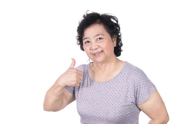 Aziatische senior vrouw waardoor u duimen omhoog op witte achtergrond, — Stockfoto