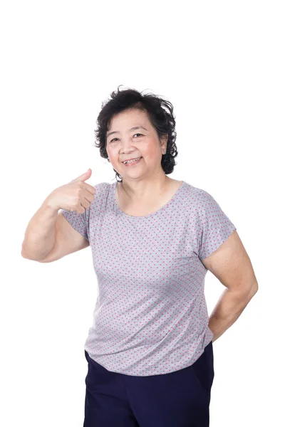 Asian senior female giving you thumbs up over white background, — Stock Photo, Image