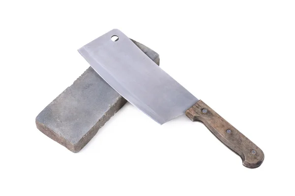 Sharpening or honing a knife on a waterstone, grindstone on the — Stock Photo, Image