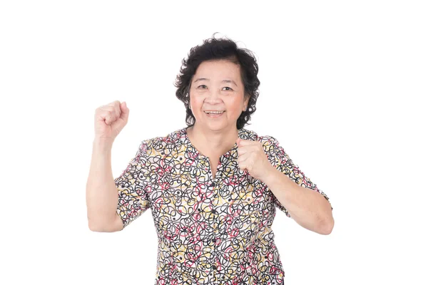 Asian old woman giving punch over isolated white background — Stock Photo, Image