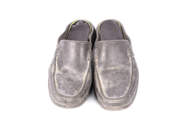 Alter schmutziger Schuh isoliert auf weißem Hintergrund — Stockfoto