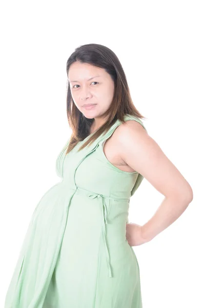 Uma mulher grávida com dores nas costas. isolado em fundo branco — Fotografia de Stock