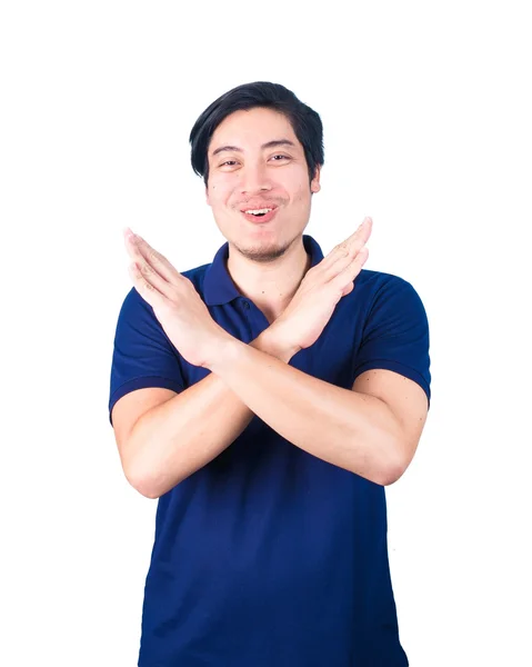 Азиатский молодой человек накачался, делая X знак формы с его руками и — стоковое фото