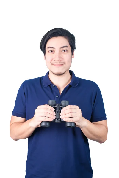 Asian guy holding binoculars, isolated on a white background. — Stock Photo, Image