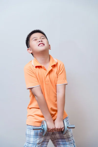 Asian strong boy lifting weights, — Stock Photo, Image