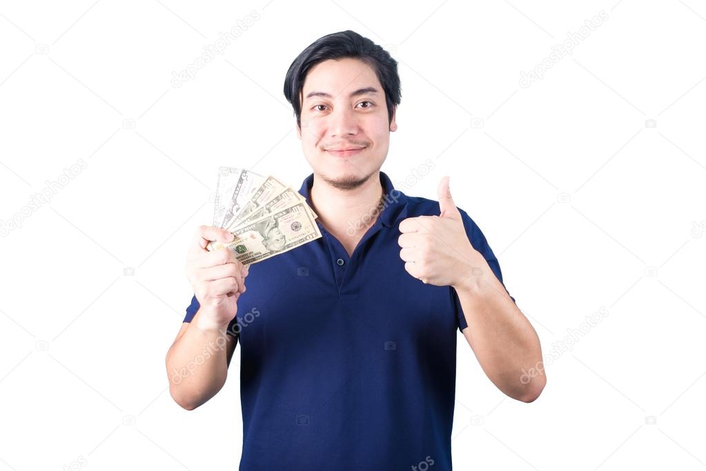 Asian handsome man holding money while standing isolated on whit