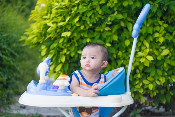 Asian baby in the baby walker — Stock Photo, Image