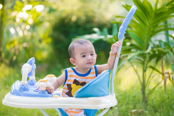 Asian baby in the baby walker — Stock Photo, Image