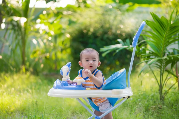 Asian baby in the baby walker — Stock Photo, Image