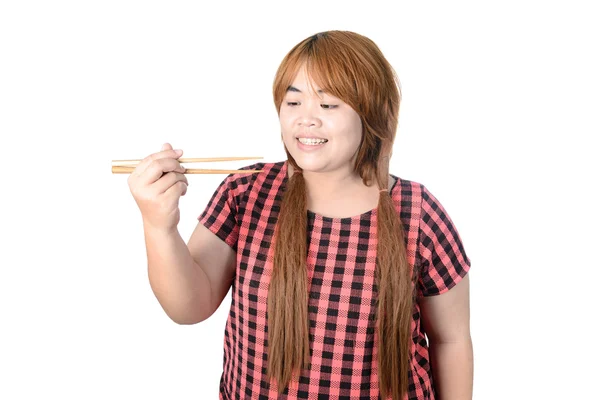 Asian plump woman holding chopsticks, isolated on white backgrou — Stock Photo, Image