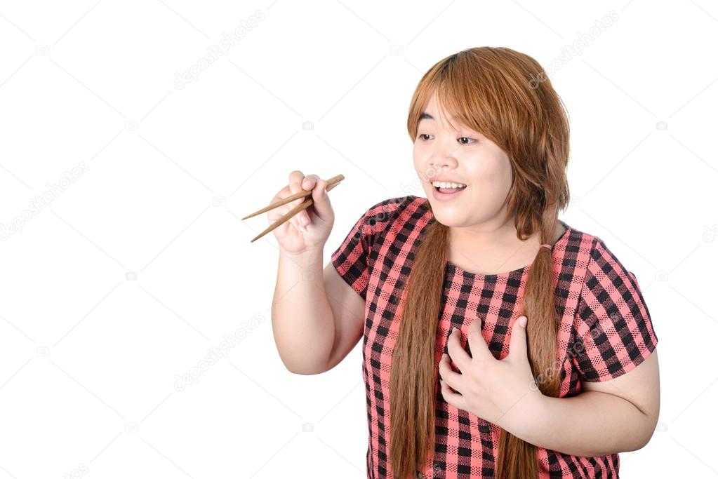 Asian plump woman holding chopsticks, isolated on white backgrou
