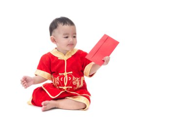 Cute Asian baby in traditional Chinese suit with red pocket, Iso