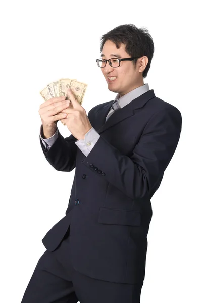 Success Asian businessman holding dollar money, isolated — Stock Photo, Image