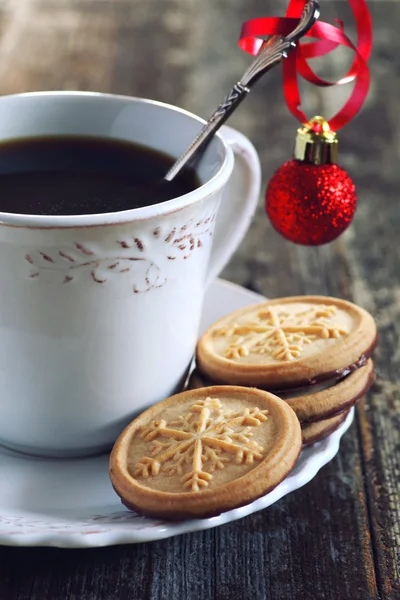 Cup of coffee and christmas sugar cookies — Stock Photo, Image