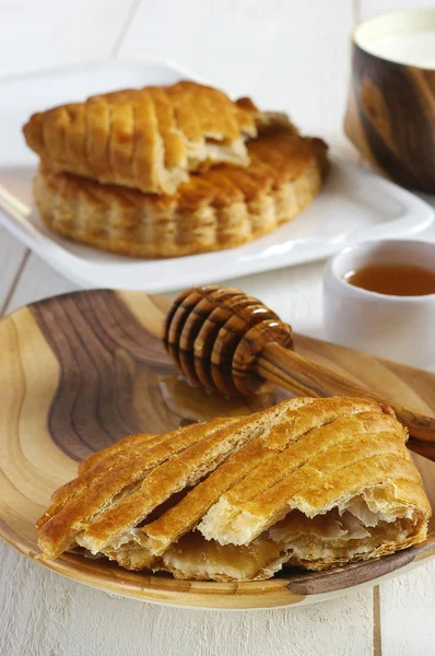 Traditional sweet French breakfast: puff pastry with apple jam — Stock Photo, Image