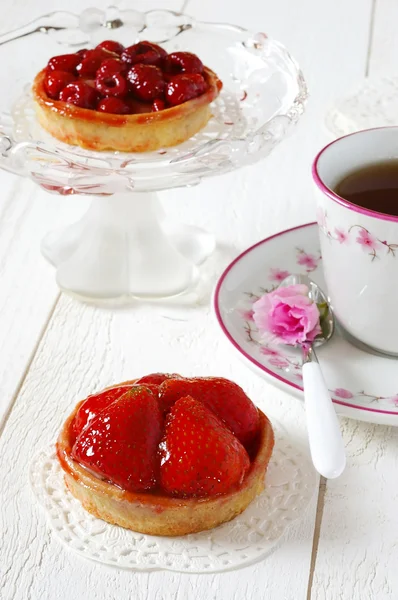 Romantic Tea Party: fruit cakes and flower azalea — Stock Photo, Image